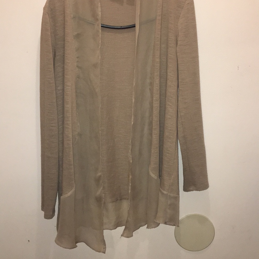 Brown blouse that has only been worn one time.